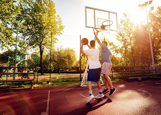 Engage in a game of basketball at the court in Central Park Flower Valley, Flamingo Floors