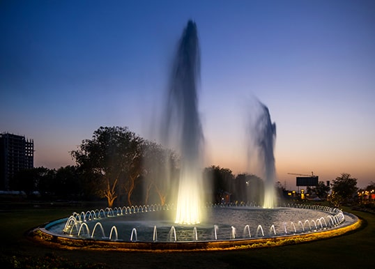 Witness the elegance of the Flora Fountain at Aqua Front Towers, part of Central Park Flower Valley