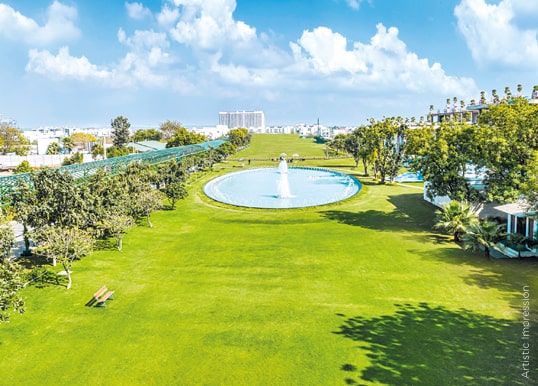 Enjoy the scenic view of a green-facing plot at The Orchard - Central Park
